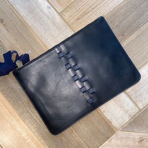 Clare V black and navy clutch.